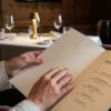 Guest_holding_luxury_menu
